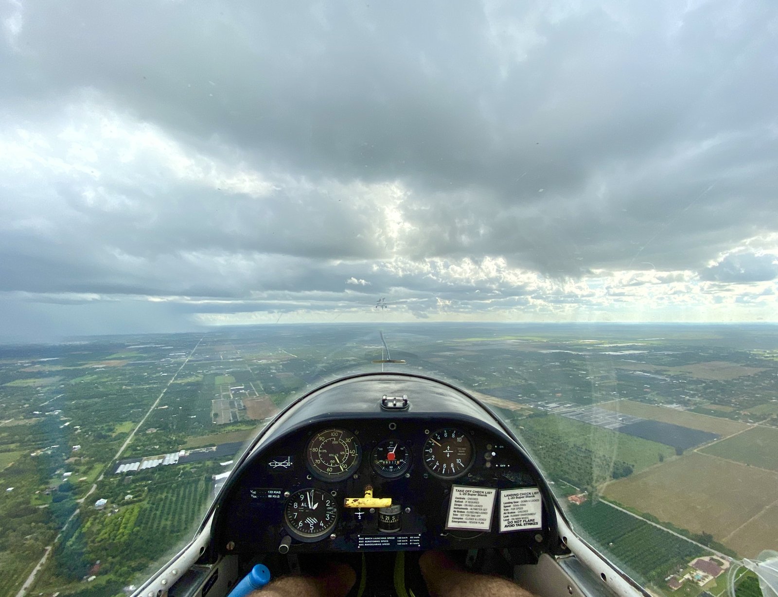 Cockpit view on an overcast soaring day with the Everglades stretching to the horizon
