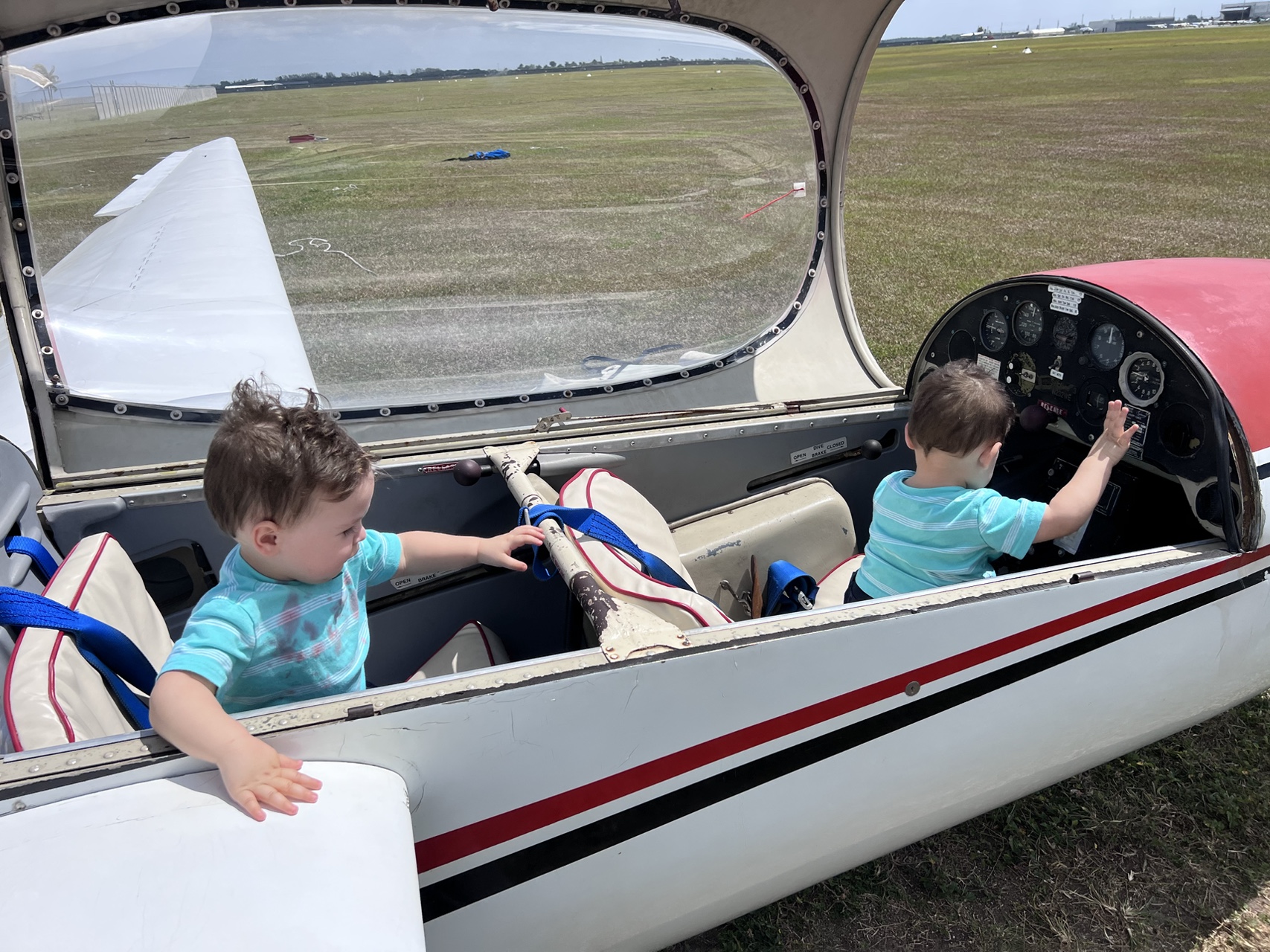 Kids exploring a Miami Gliders sailplane